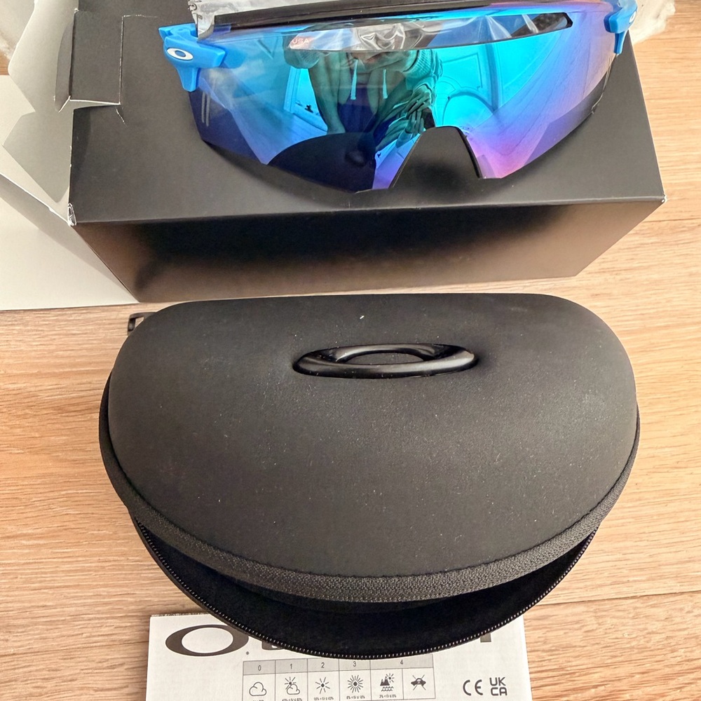 Oakley Sunglasses with Blue to Purple Iridium Lens
